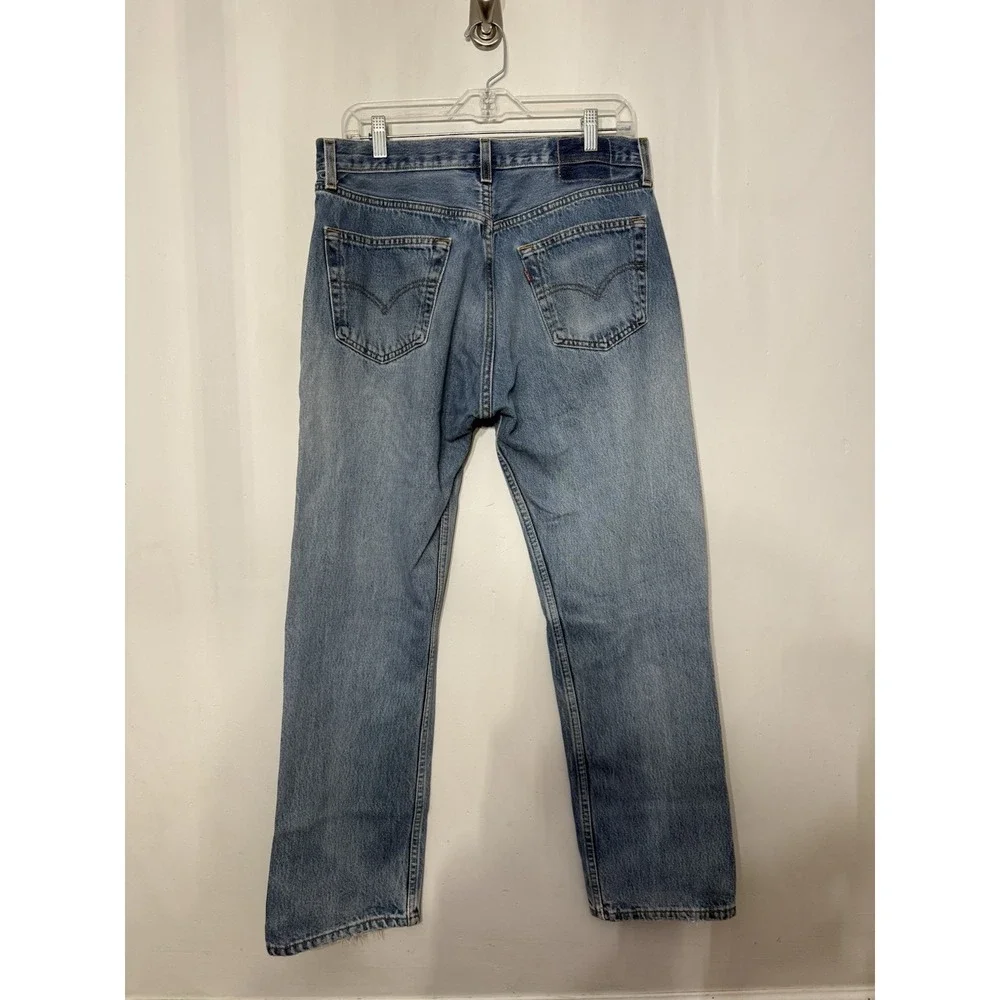 VTG Levis 501 Mens 33x30 Light Wash Jeans  Made USA Ripped Repair Distressed 90s